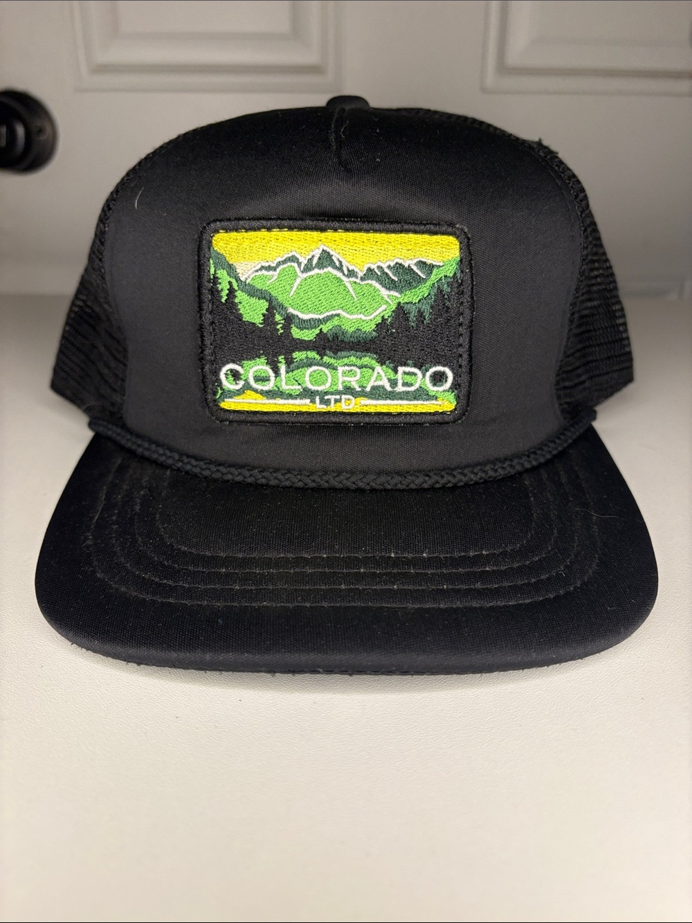 CO limited Black Trucker Hat with Green Mountain Patch